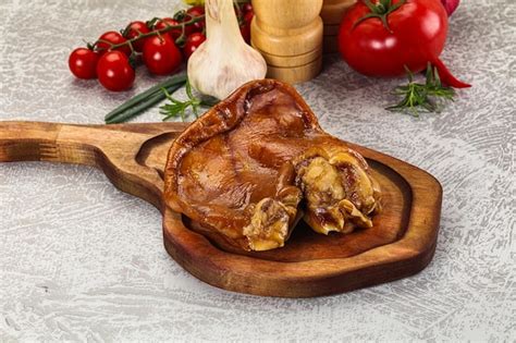 Premium Photo Smoked Pork Ear Snack Appetizer
