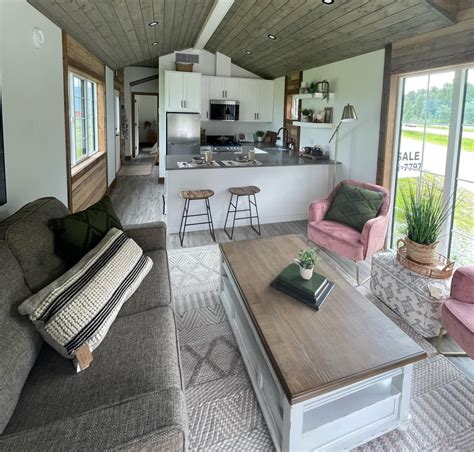 Cottage-Core Elkhorn Tiny House Sleeps Four in Stunning Layout