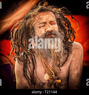 Naked Naga Sadhus Taking A Holy Bath During The Kumbha Or Kumbh Mela In