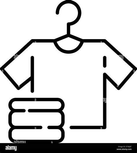 White T Shirt On Hanger And Folded Clothes Laundry And Cleanliness