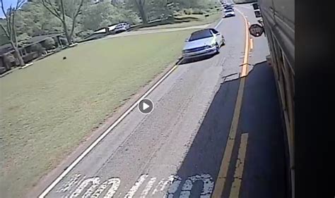 Watch Car Illegally Pass School Bus Stop Arm Police Warn Public