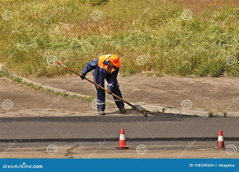 Laying Asphalt By Workers Road Construction Modern Technology Of