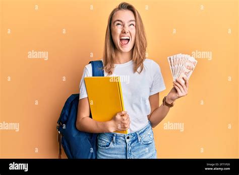 Beautiful Blonde Woman Wearing Student Backpack And Holding Turkish