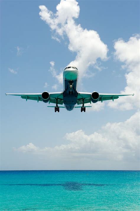 Big Plane Landing Over Water Stock Image - Image of risk, travel: 10947225