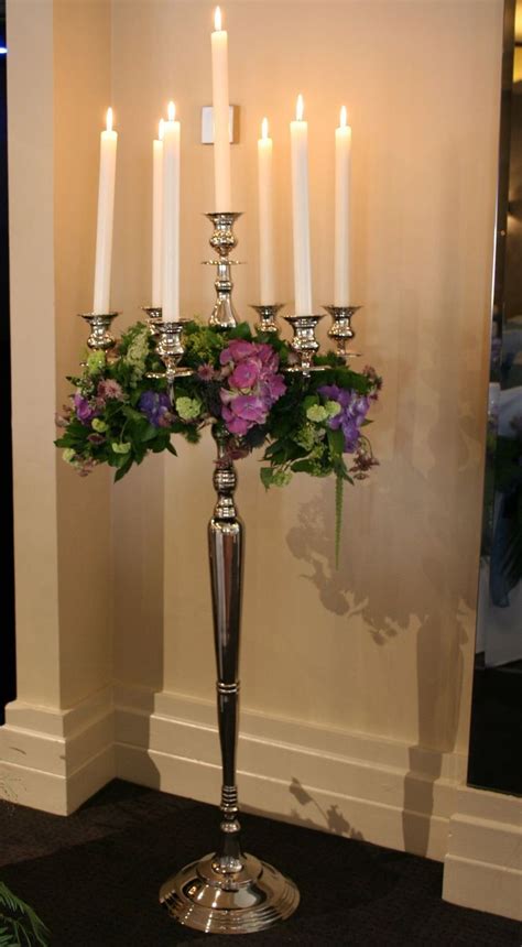 Floor Standing Candelabra Decorated With Tasteful Flowers Candelabra