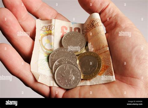 Cash In Hand British Pounds Stirling Stock Photo Alamy