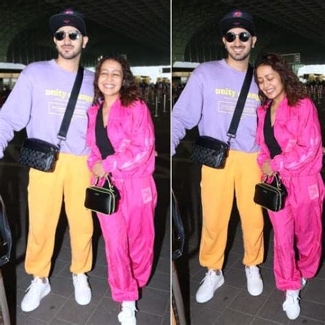 Neha Kakkar Hides Her Tummy At Mumbai Airport Just Before Her Pregnancy Announcement View Pics