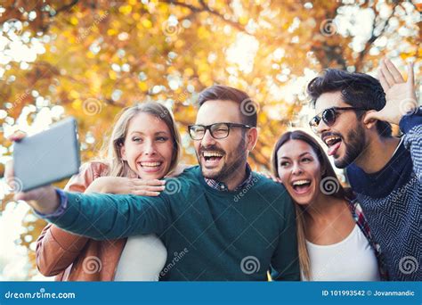 Group Of Four Funny Friends Taking Selfie Stock Photo Image Of Shot