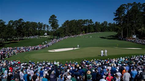 General View As Masters Champion Adam Scott Of Australia Plays A Stroke