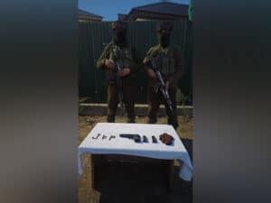 J K Sopore Police Busts Hideout Recover Arms Ammunition