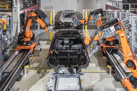 Automated Surface Processing At Bmw Group Plant Regensburg Trio Of