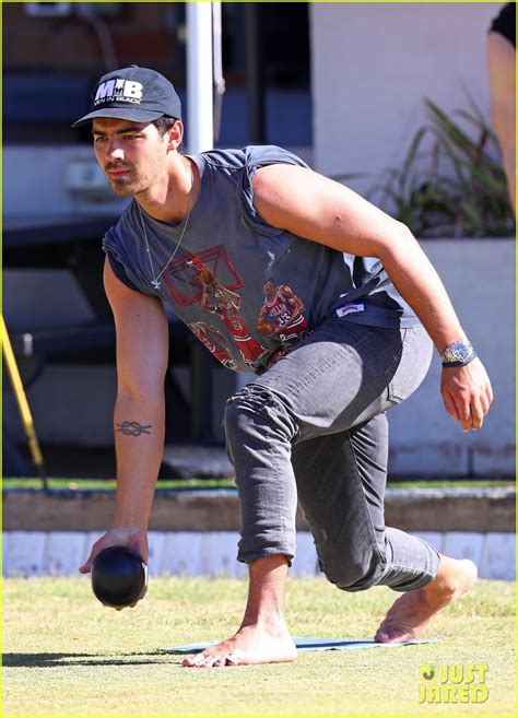 Nick Jonas Shows Off Massive Biceps In Australia Photo