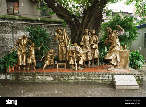 Statue Of Opium Smokers In One Of Public Park Of Guangzhou China Stock