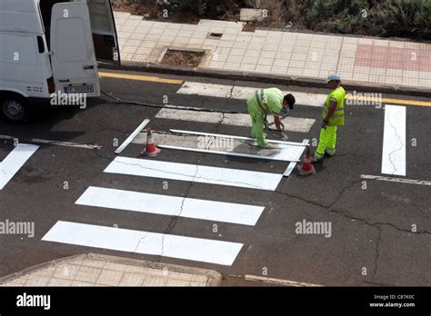 Repainting Faded Road Markings Stock Photo Alamy