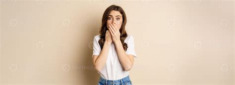 Shocked Brunette Woman Gasping Looking Speechless At Camera Cover