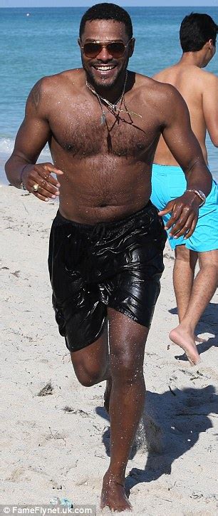 Maxwell Shows Off Impressive Torso As He Hits Beach With Bikini Clad