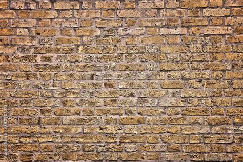 Yellow brick wall texture Stock Photo | Adobe Stock