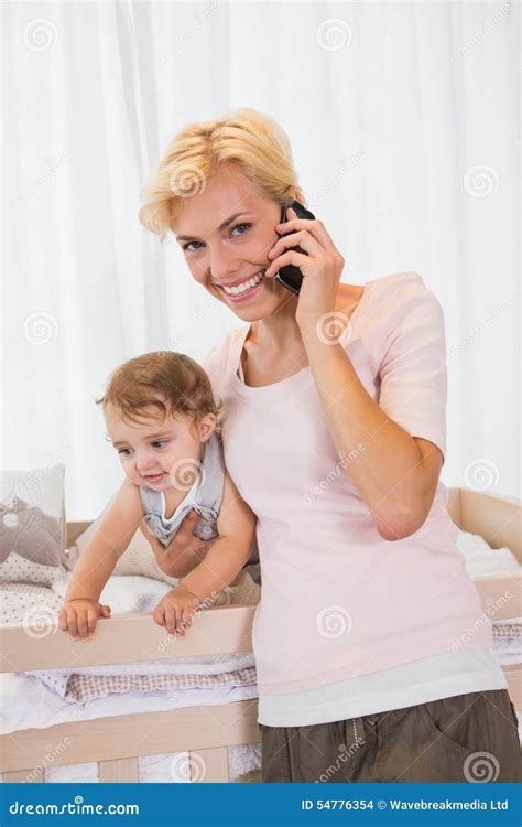 Portrait Smiling Blonde Woman With His Son Phoning Stock Photo Image Of Call Domestic