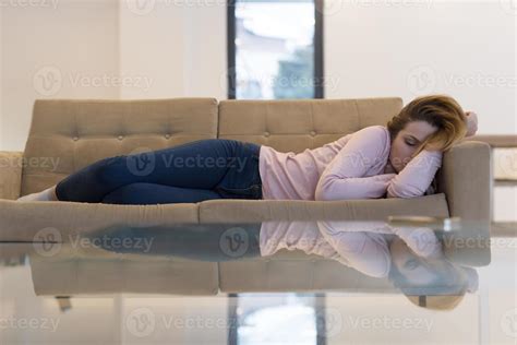 Woman Sleeping On Sofa 10356487 Stock Photo at Vecteezy