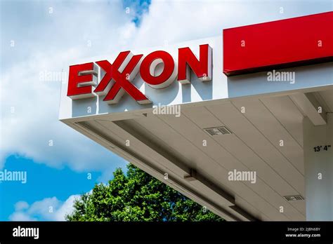 Exxon Gas Stations Outdoor Facade Brand And Logo Signage In Red