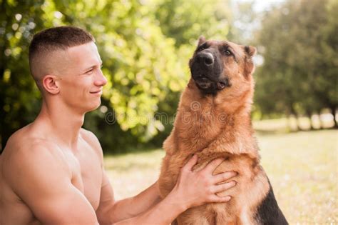 Athletic Guy With A German Shepherd Stock Image Image Of Athletic