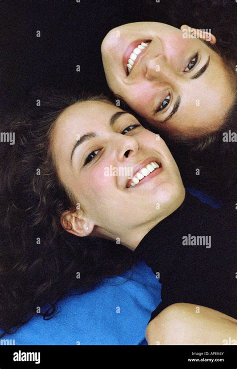 Two Pretty Brunette Twins Smiling Hi Res Stock Photography And Images Alamy