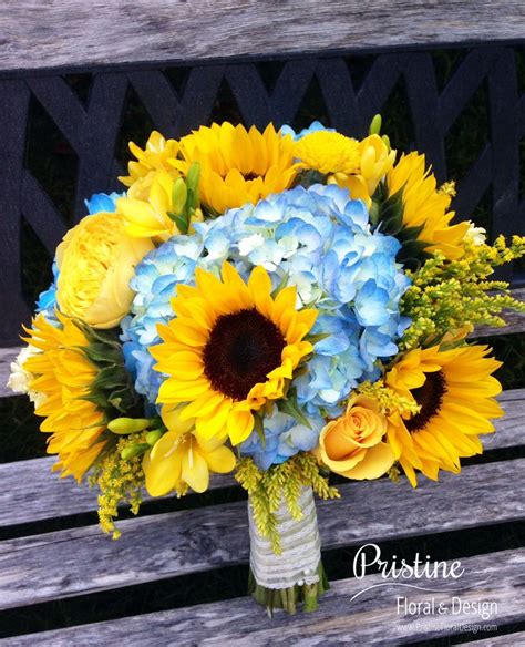 Bridal Bouquet Designed Using Blue Hydrangea Sunflowers Freesia