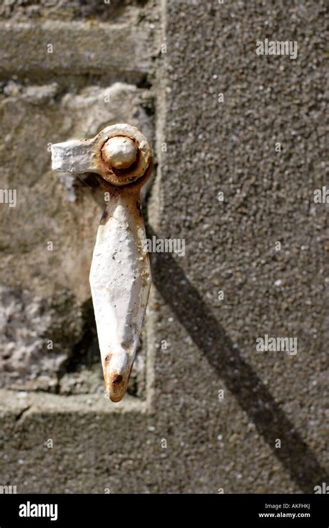 Rusting White Painted Window Shutter Latch Stock Photo Alamy