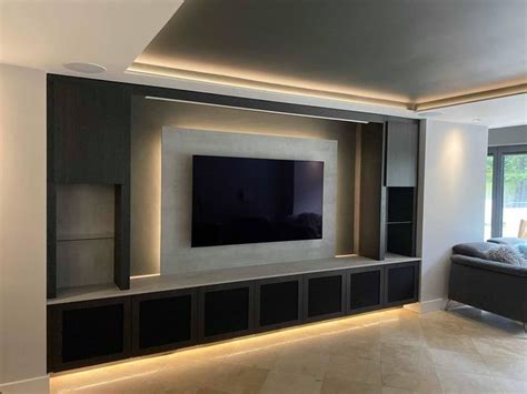 Modern Living Room With Built In Entertainment Center And Large Flat