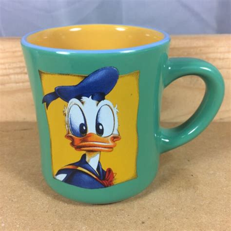 Disney Donald Duck Diner Style Coffee Mug Cup Green Outside Yellow