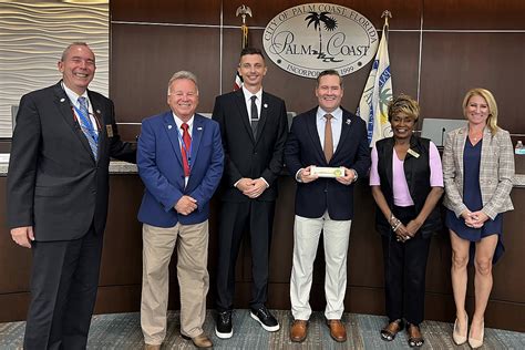 Palm Coast Mayor Presents Us Rep Mike Waltz With Key To The City