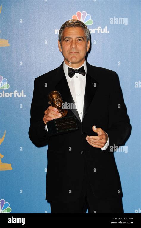 George Clooney Wearing Giorgio Armani Tuxedo In The Press Room For