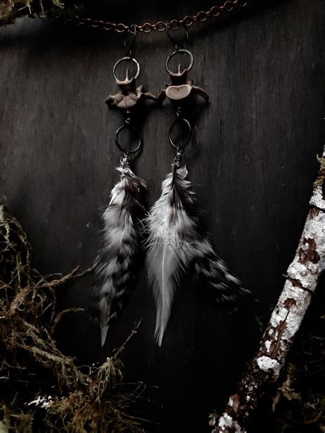 Rooster Feather Raccoon Vertebrae Earrings Woodland Shrine