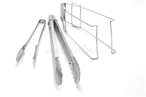 Hot Plate Tongs Kitchen Tongs And Ice Tongs On White Background Stock Photo Image Of Helps