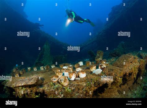 Diver Discover Tableware And Artifacts On USS Saratoga Marshall Islands Bikini Atoll Micronesia