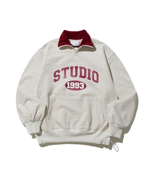 Musinsa Studio Studio Arch Logo Half Zip Oat Beige