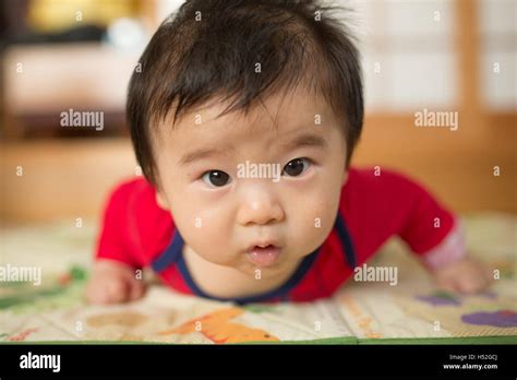 A Baby Lying Down Stock Photo Alamy