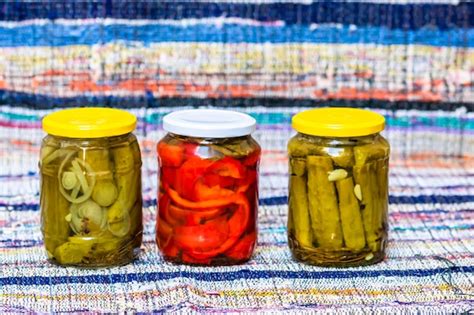 Premium Photo Glass Jars With Pickled Red Bell Peppers And Pickled