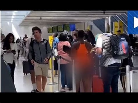 Woman NAKED From Waist Down Stuns Fellow Passengers Waits Line For