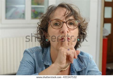 Portrait Mature Woman Finger On Lips Stock Photo 431547532 Shutterstock