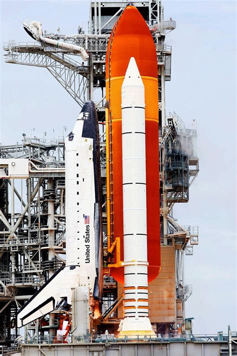 Space Shuttle Atlantis Attached To Its Bright Orange External Fuel