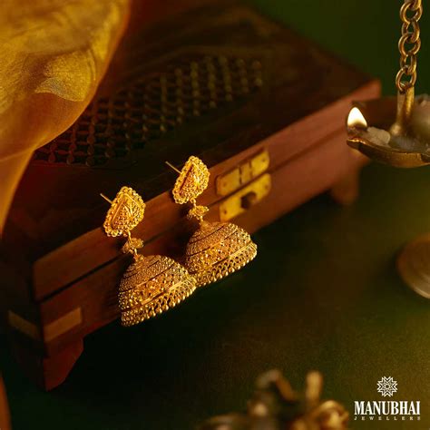 Buy Traditional Spade Pattern Charming Gold Jhumkas Online