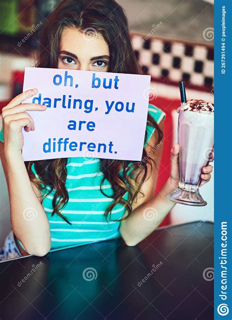 Make A Statement Cropped Portrait Of An Attractive Young Woman Holding