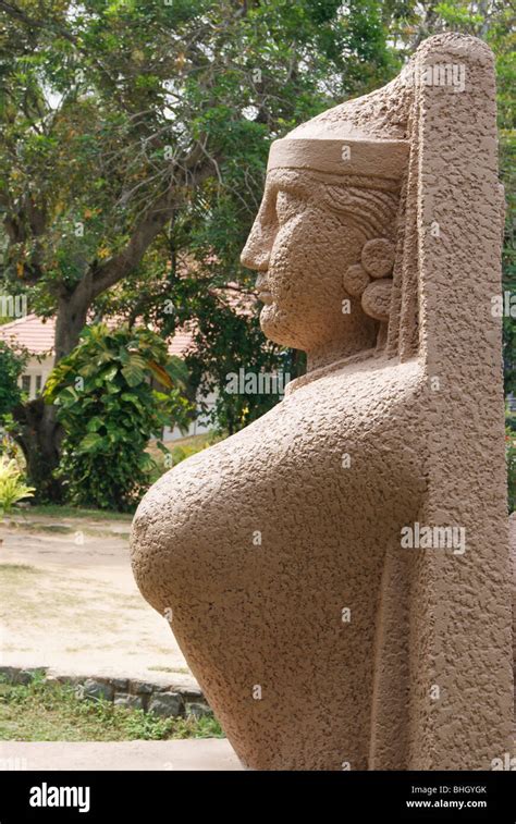Stone Sculpture Of A Half Naked Ancient Indian Woman In Lake Shore Garden Of Kerala India Stock