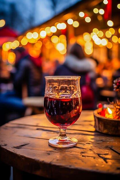 Premium AI Image | hot mulled wine in a glass at the Christmas market ...