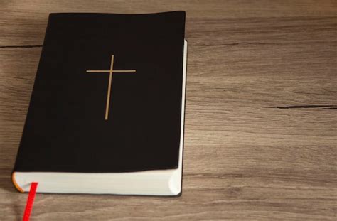 Premium Photo | Holy bible on the table