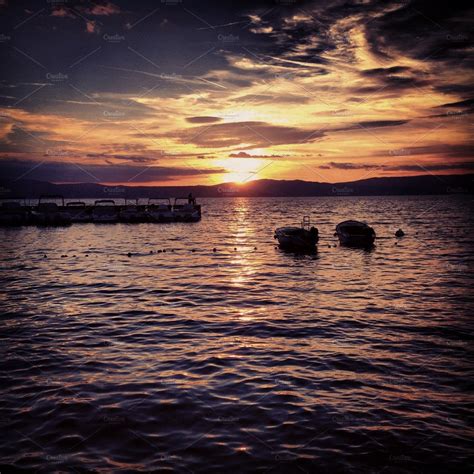 Sunset at the sea with boats containing sea, boat, and sunset | Nature Stock Photos ~ Creative ...