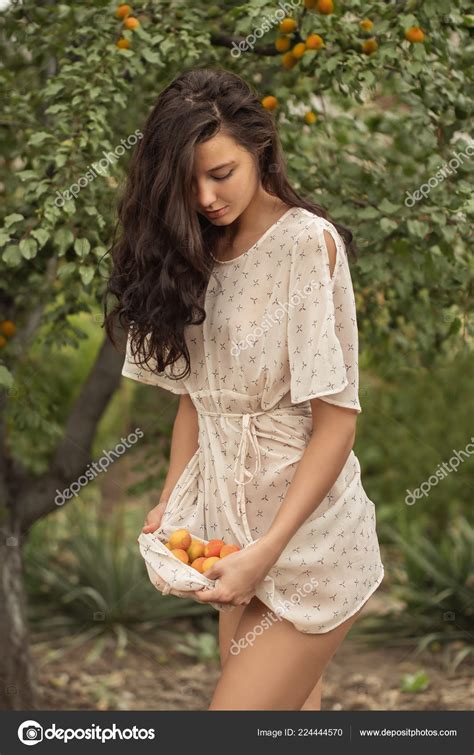 Stunning Sexy Brunette Beauty In Garden On Nature Outdoors Stock Photo By Dimabl