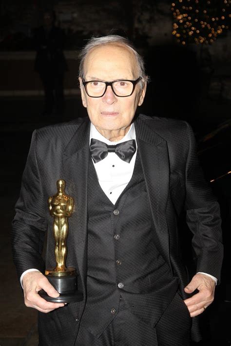 Ennio Morricone wins the Oscar for Best Original Soundtrack at the 88th ...