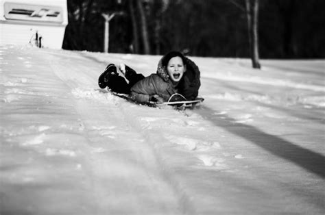 Premium Photo Cheerful Girl Playing In Snow